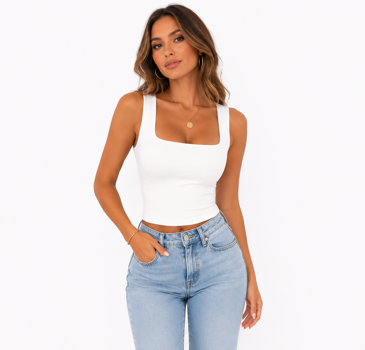A woman modeling a fitted white ribbed tank top with a square neckline and light-wash blue jeans against a plain white studio background.