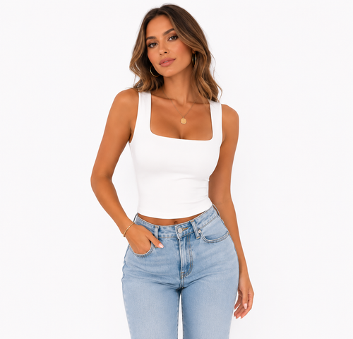 A woman modeling a fitted white ribbed tank top with a square neckline and light-wash blue jeans against a plain white studio background.